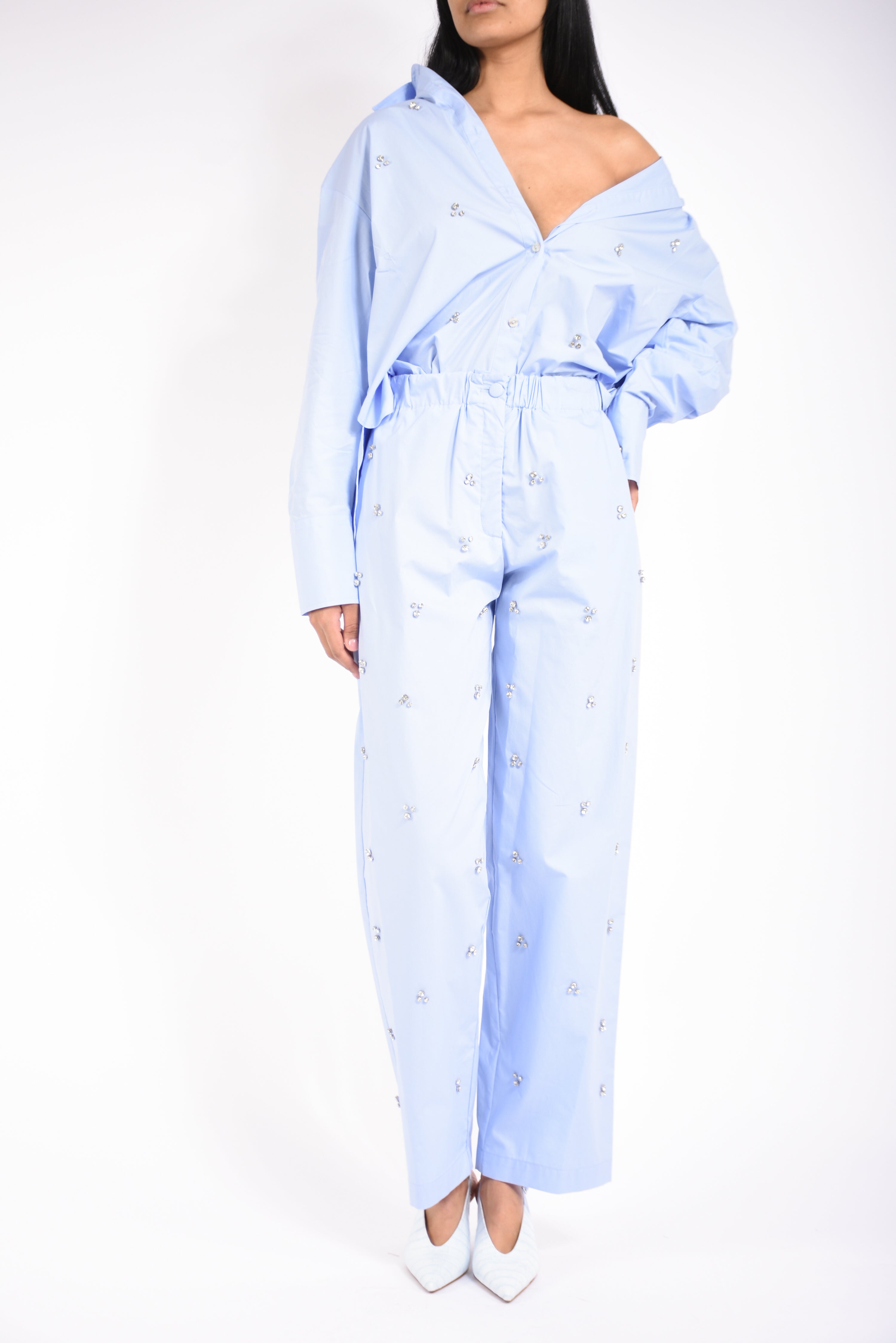 pantaloni in cotone con applicazioni