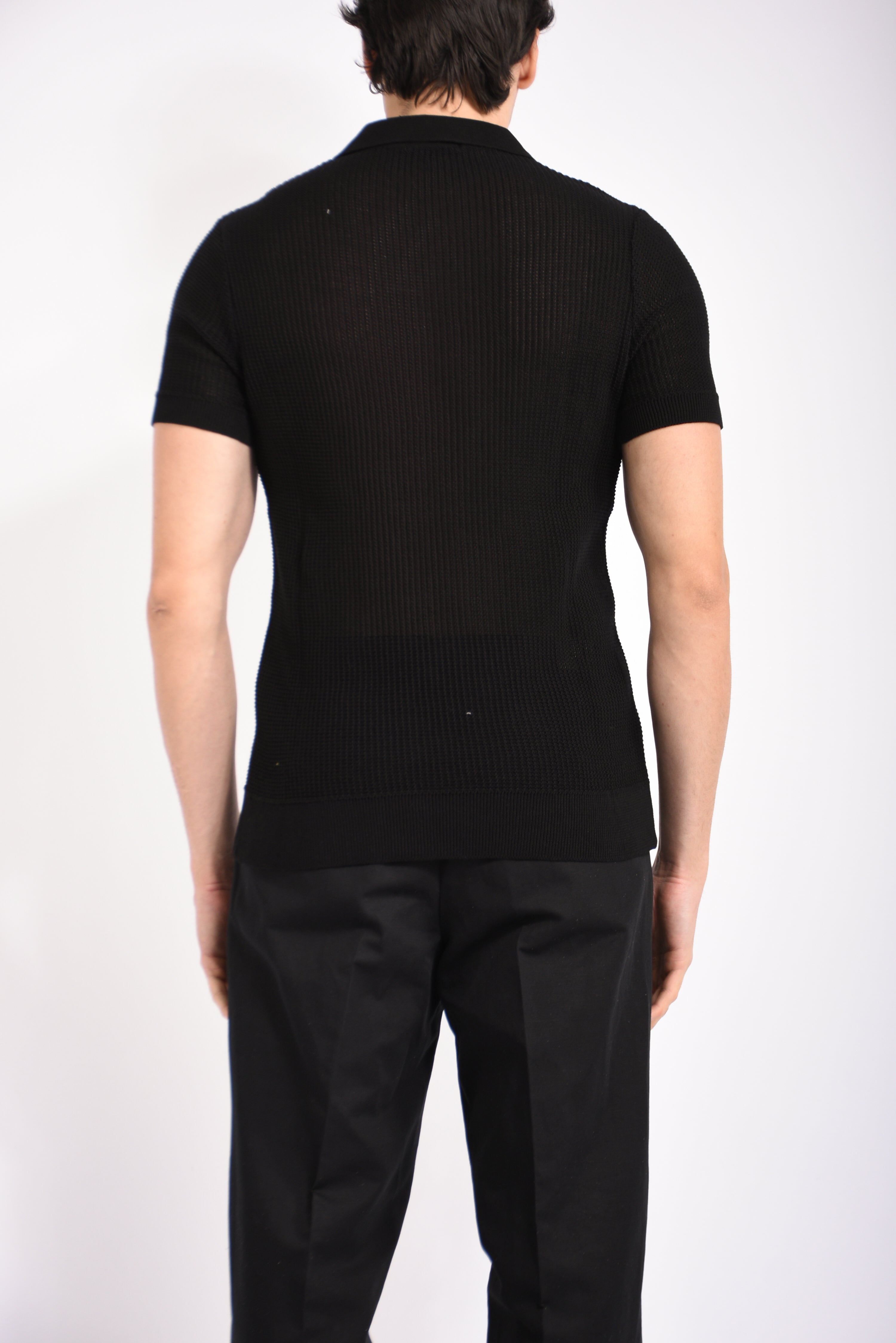 Polo traforata in cotone