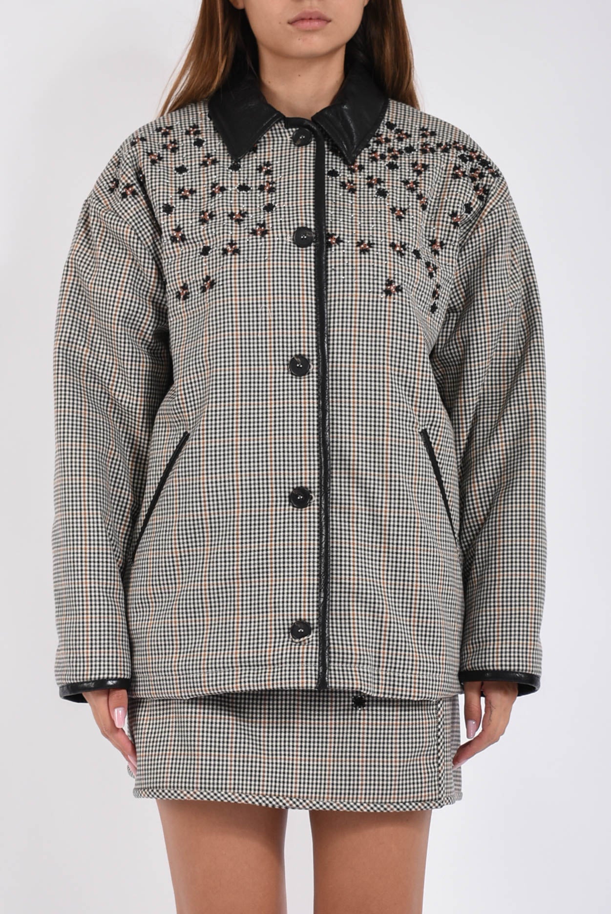 Giubbino in micro check con ricami floreali