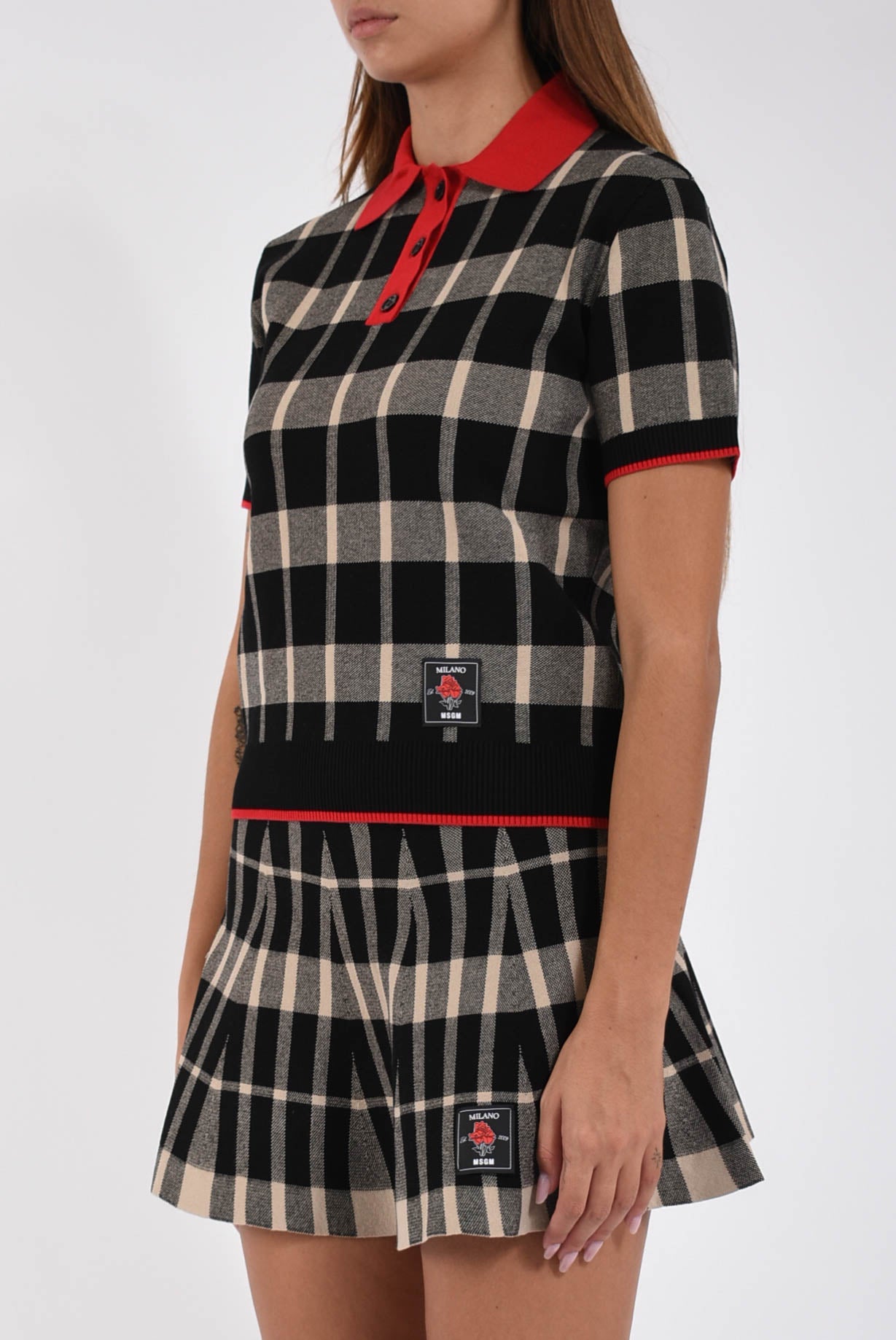 polo in techno piquet con motivo check