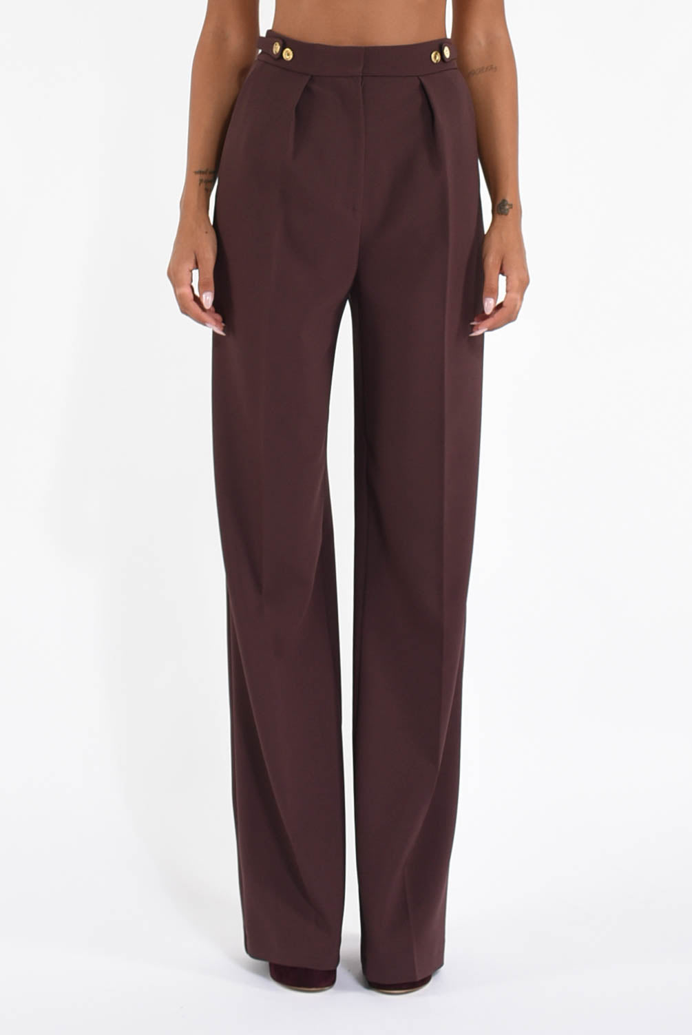 Pantaloni in crêpe con accessorio gioiello