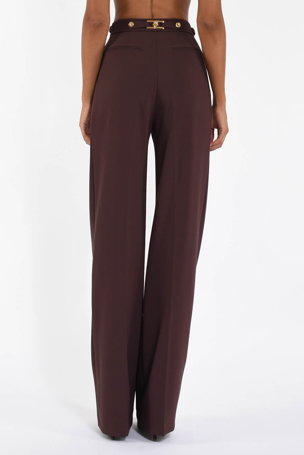 Pantaloni in crêpe con accessorio gioiello