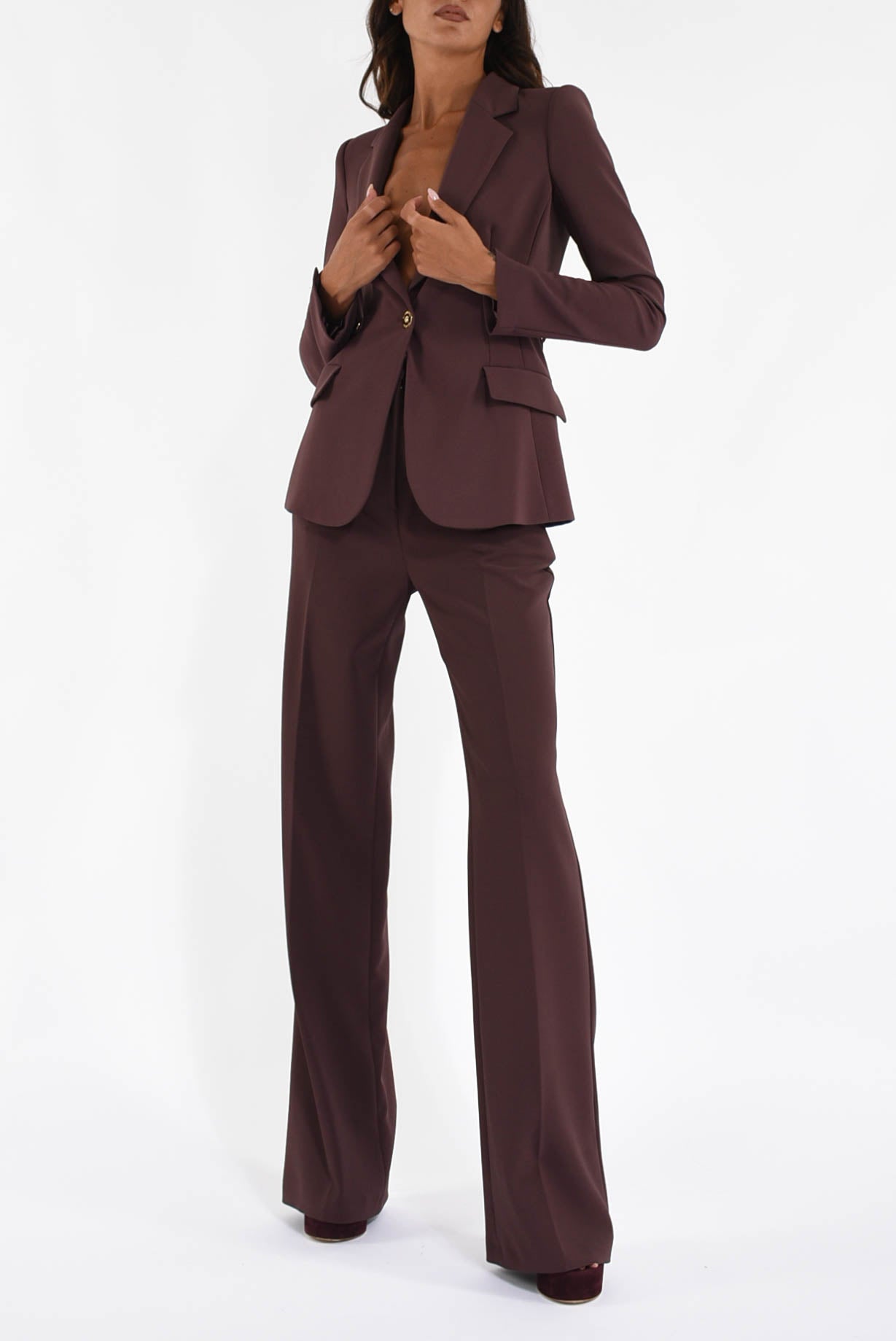 Pantaloni in crêpe con accessorio gioiello