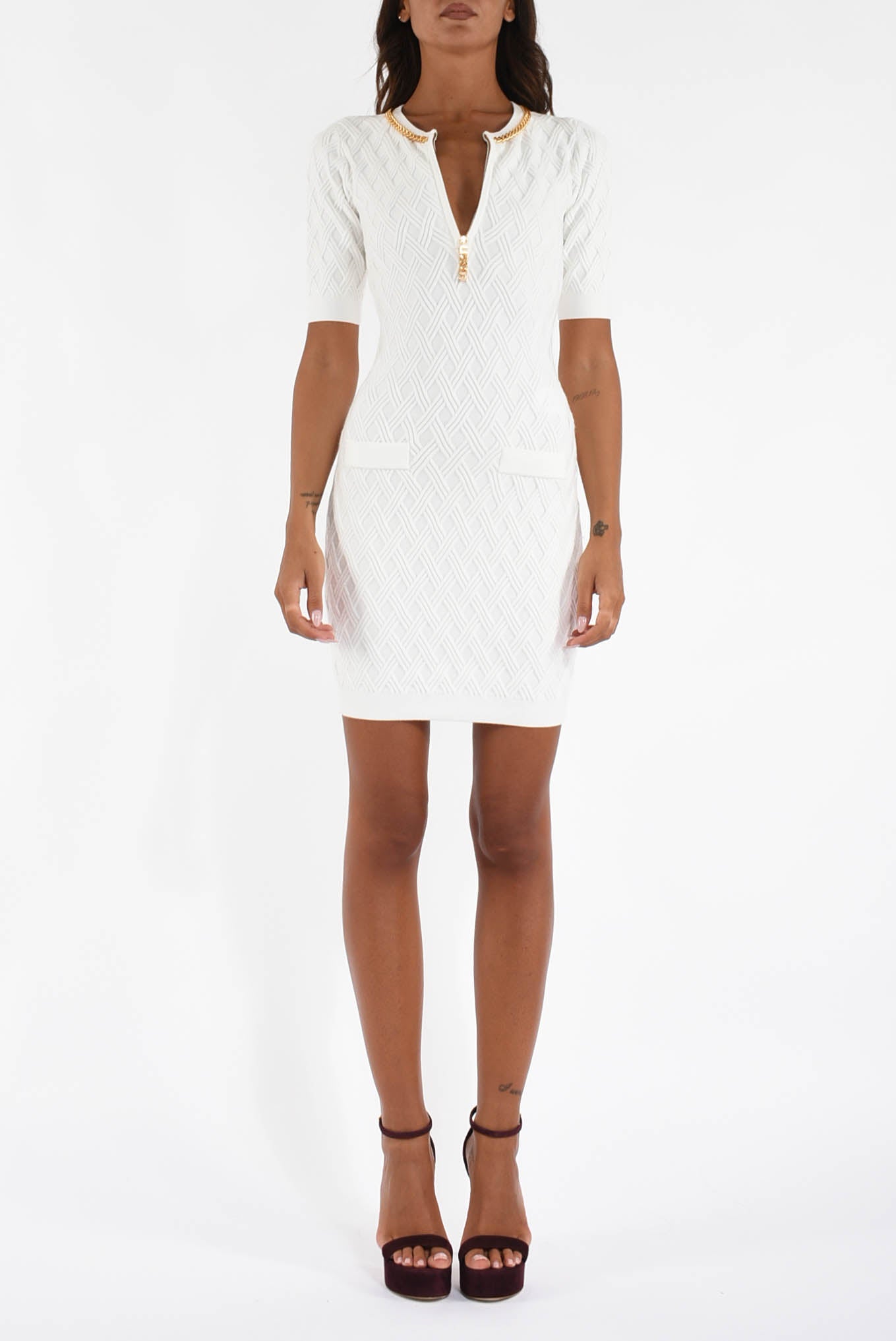 abito mini in maglia a rombi con dettaglio gioiello