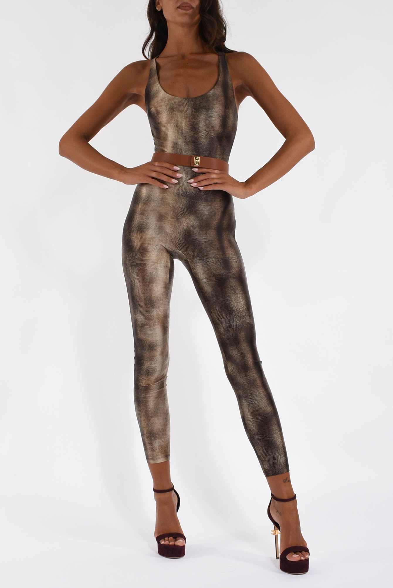 Tuta in lycra con stampa pitone e cintura