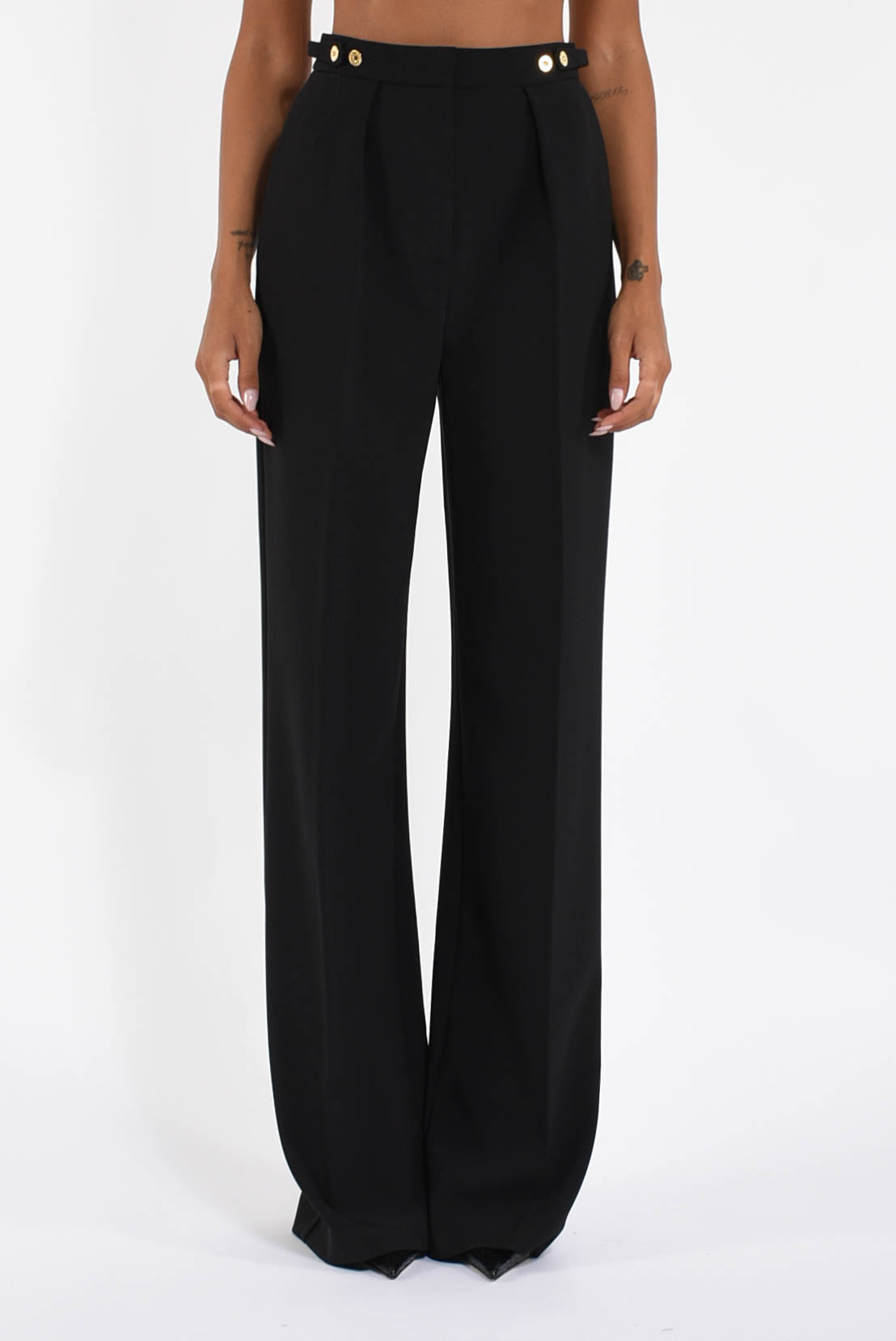 Pantaloni in crêpe con accessorio gioiello