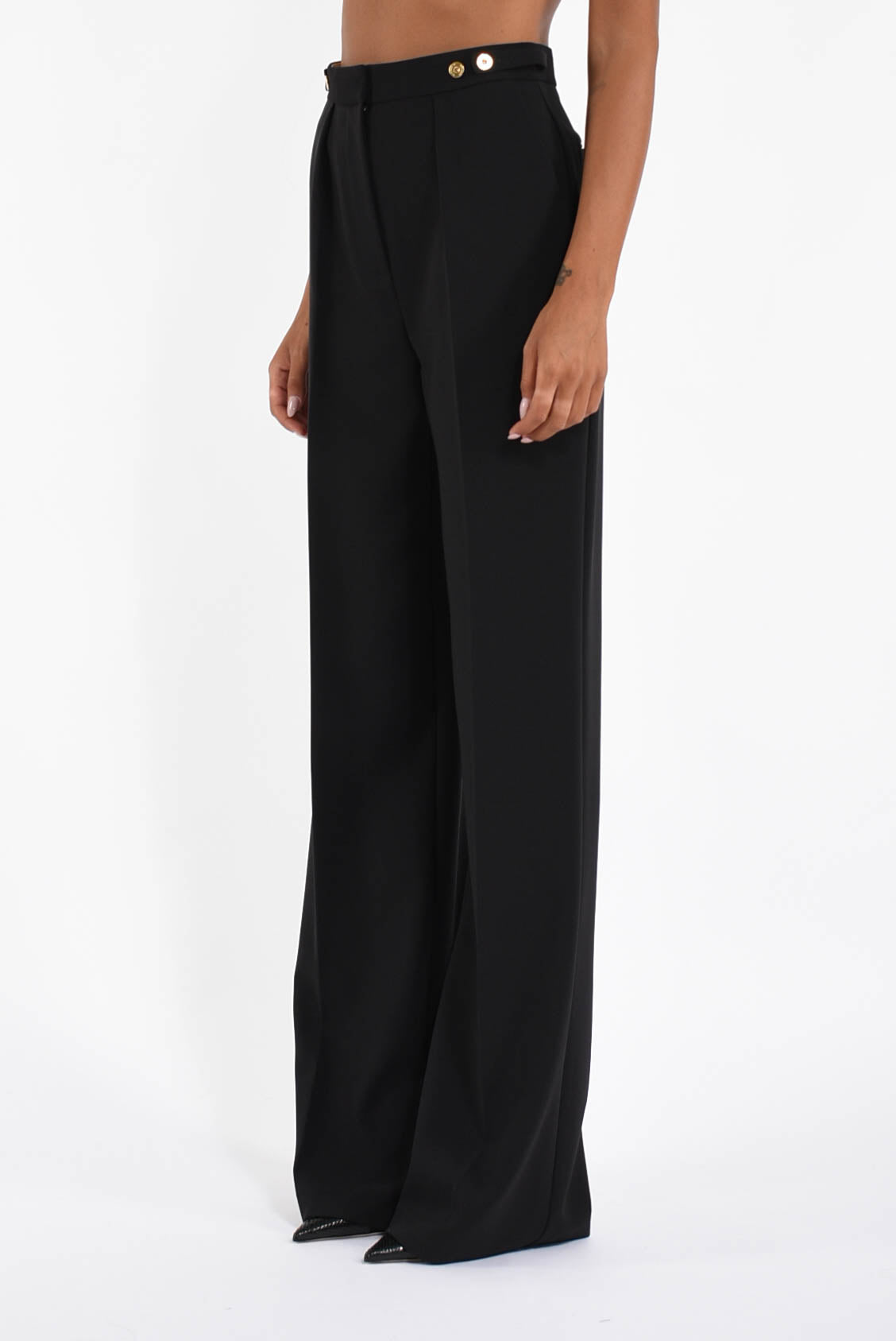 Pantaloni in crêpe con accessorio gioiello