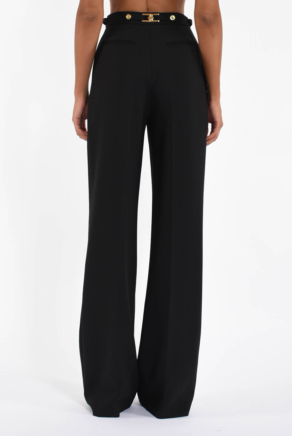 Pantaloni in crêpe con accessorio gioiello