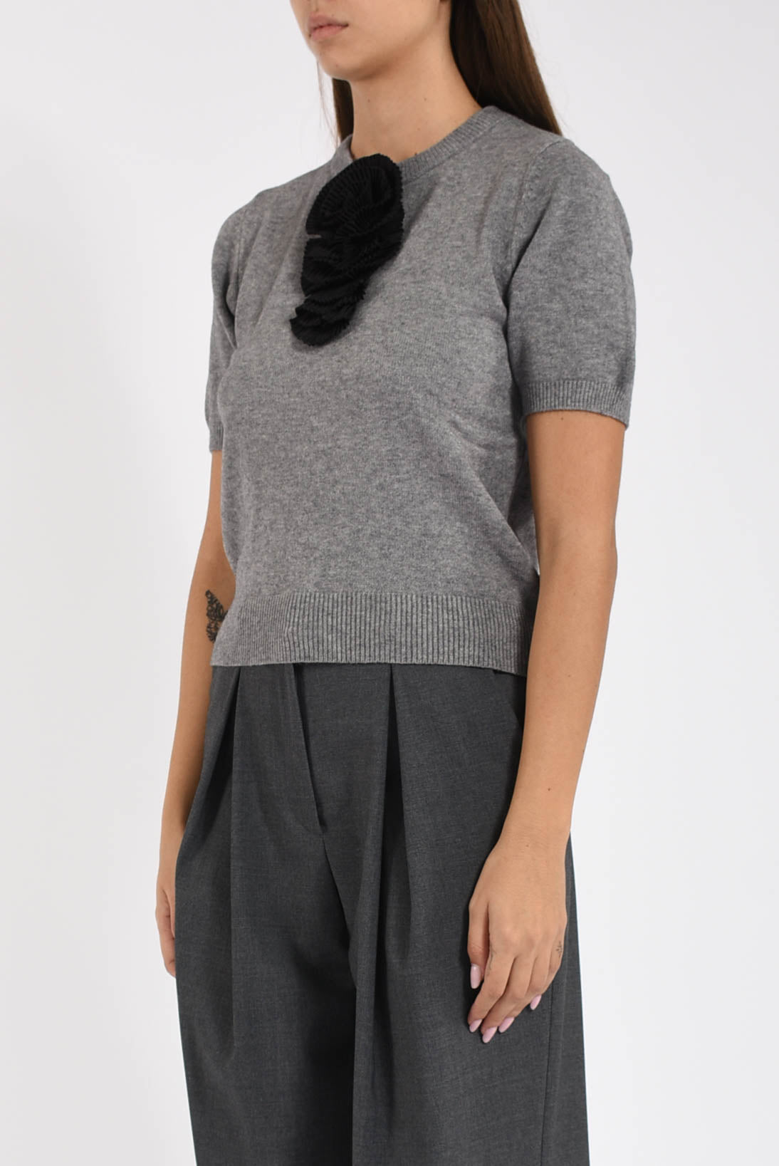 maglia in lana con dettaglio rosa