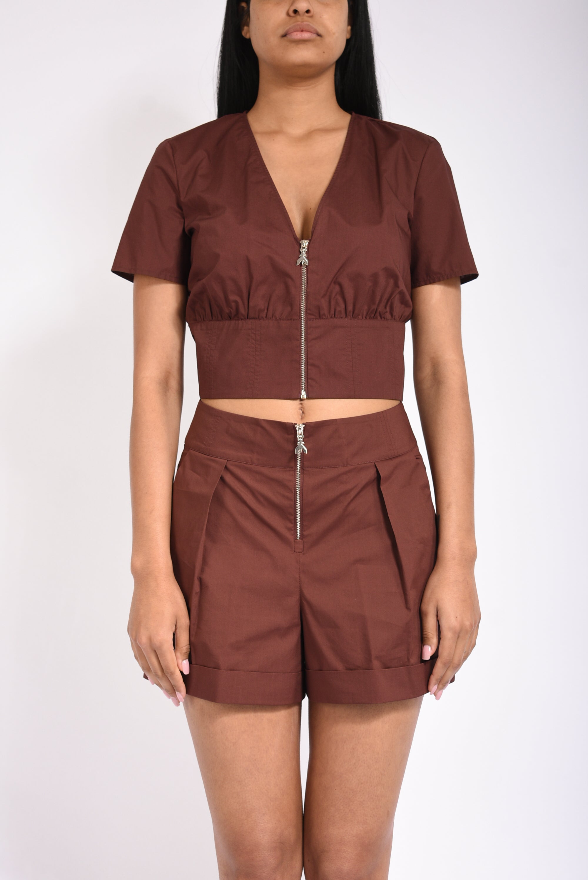 Top cropped con zip