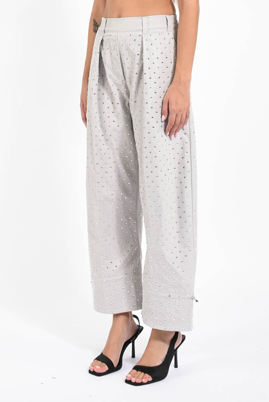 Pantaloni con strass pepita