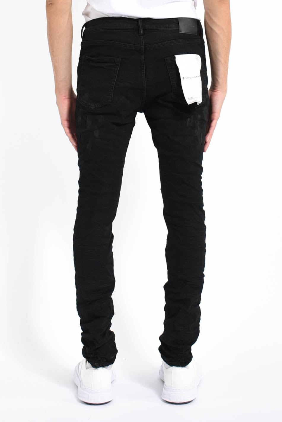 Jeans black oil spill