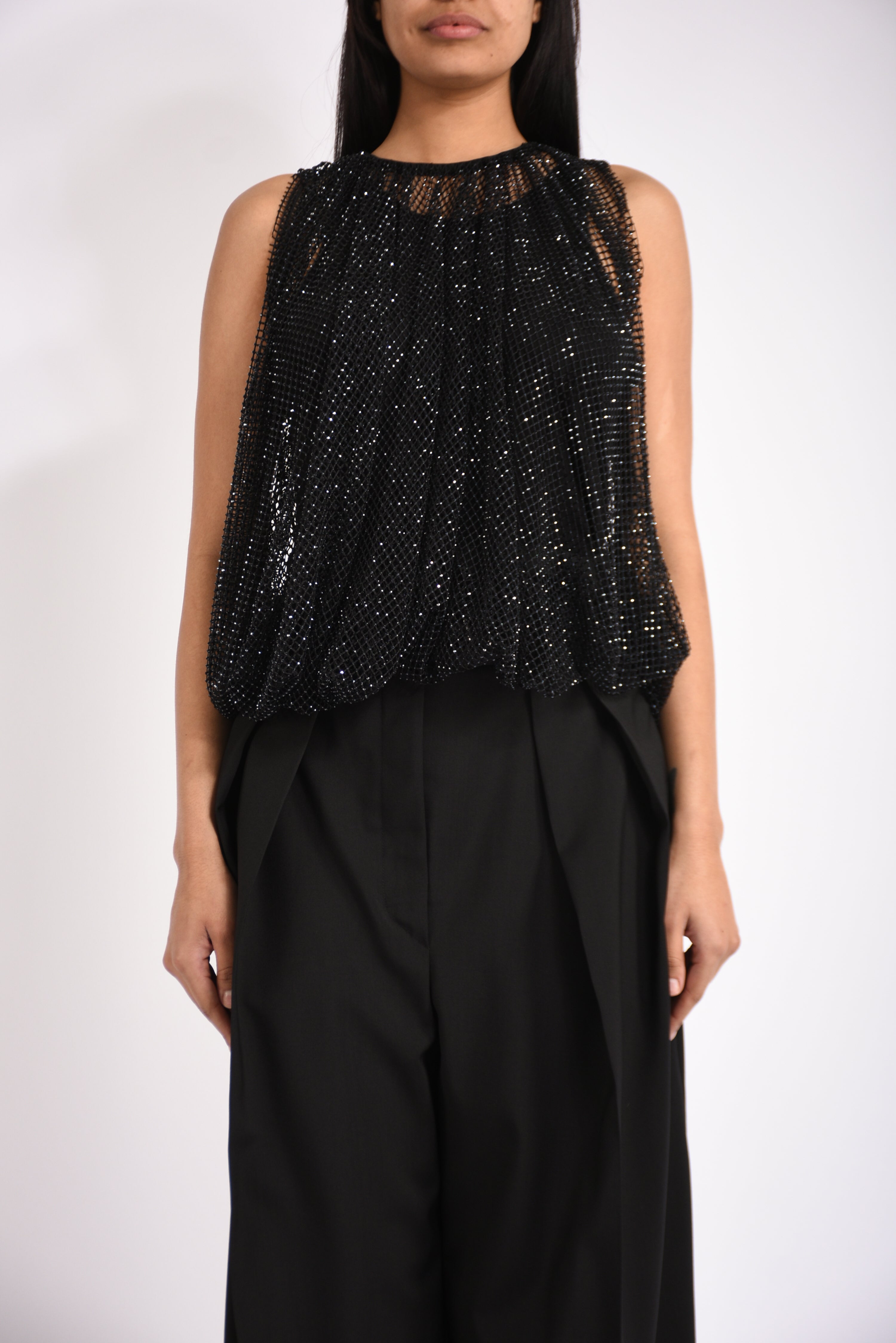 Top in rete con cristalli nodo