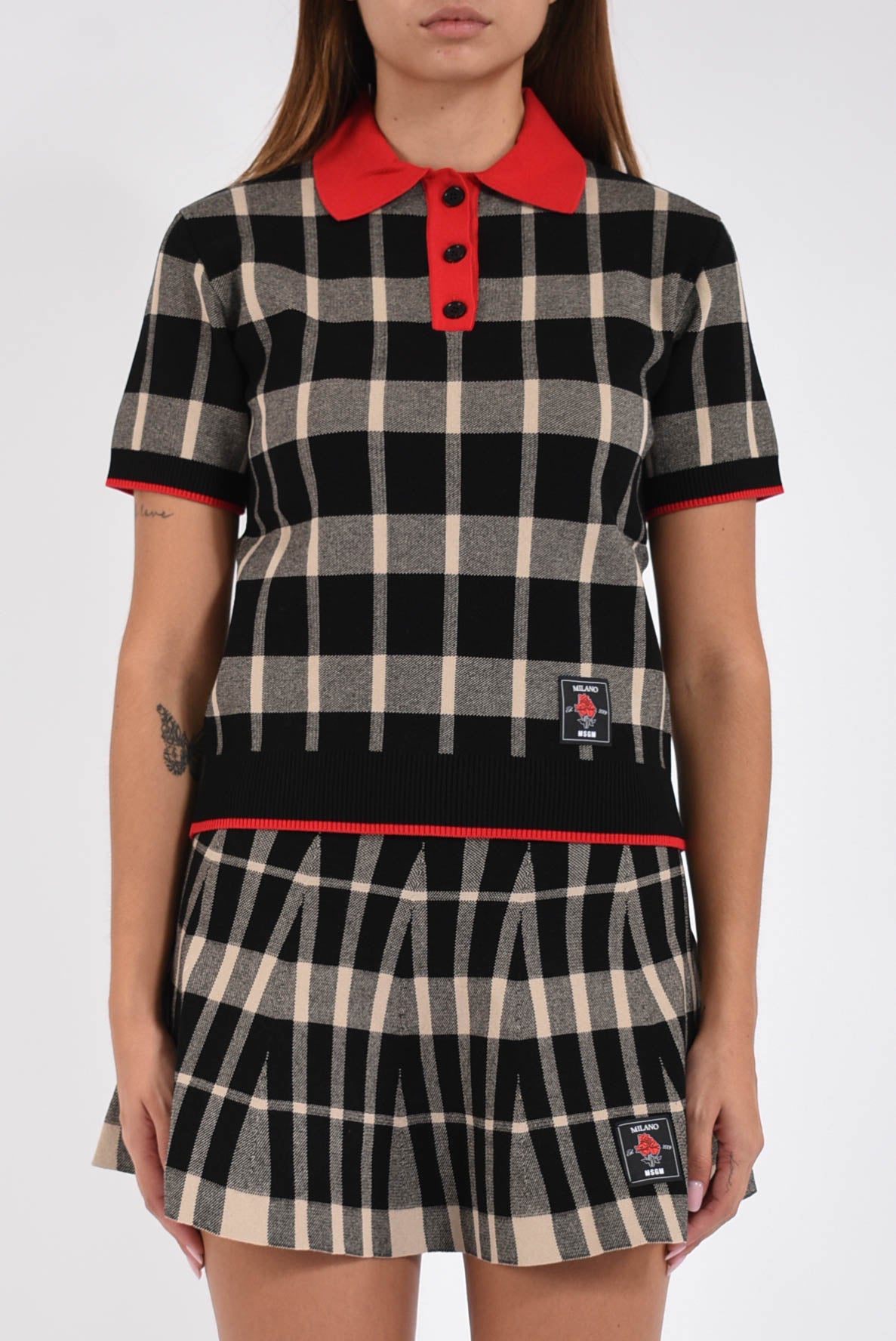polo  in techno piquet con motivo check