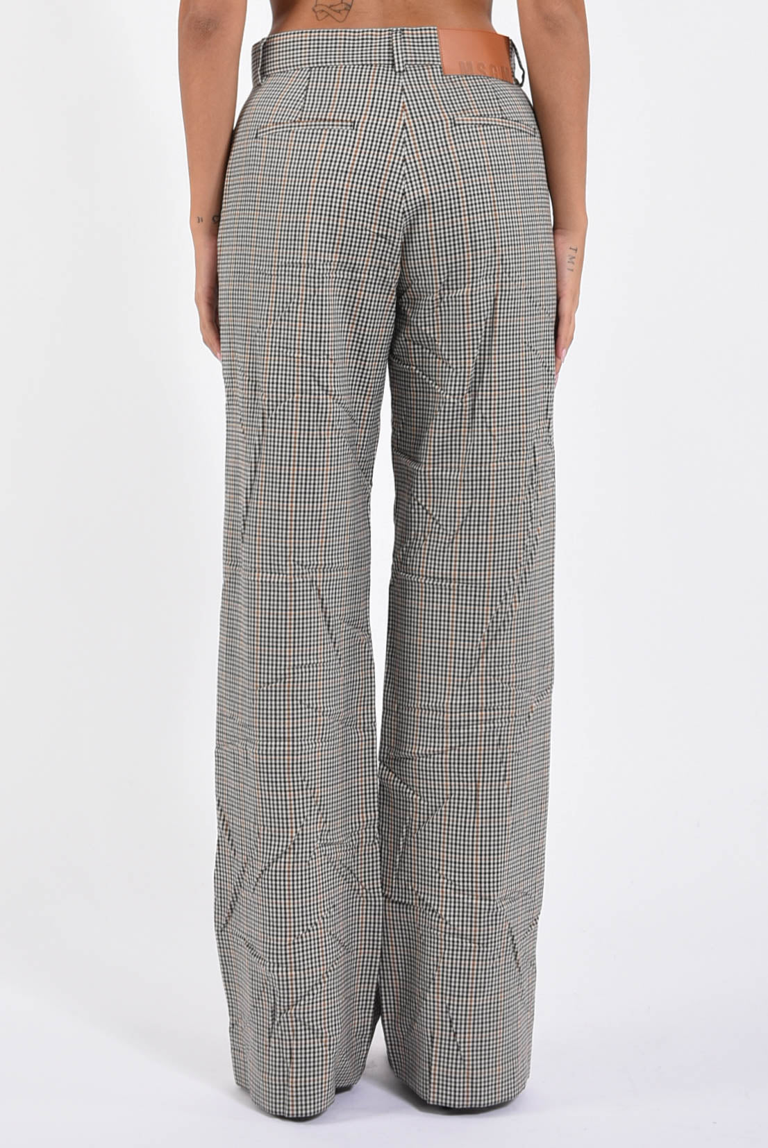 pantaloni flare in micro check