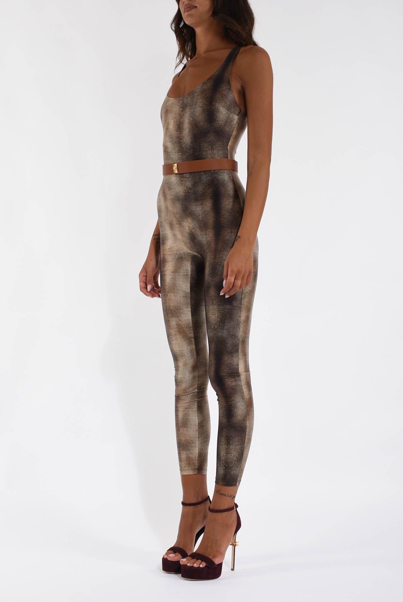 Tuta in lycra con stampa pitone e cintura