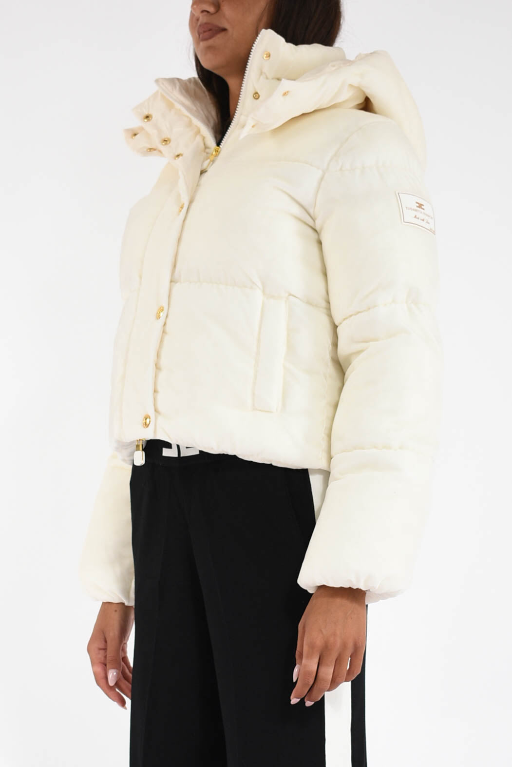 Piumino in velluto con cappuccio